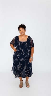 Portrait of Kim Alpough, Realtor